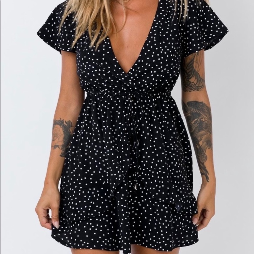 Black polka dot mini dress from Princess Polly